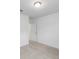 Simple bedroom with carpet, door and window at 3606 Walking Stick Way, Poinciana, FL 34759
