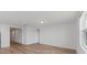 Bright and spacious living room with wood-look flooring at 3606 Walking Stick Way, Poinciana, FL 34759
