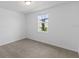Charming bedroom with a window offering natural light at 3606 Walking Stick Way, Poinciana, FL 34759
