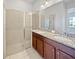 Bathroom with double vanity and a large shower at 346 Captiva Dr, Davenport, FL 33896