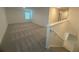 Spacious loft area with carpeted floors and plenty of natural light at 2010 Canton Park Dr, Winter Haven, FL 33881