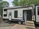 Forest River RV with exterior door and steps at 3000 Clarcona Rd # 2710, Apopka, FL 32703