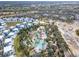 Large community pool with surrounding buildings at 7593 Gathering Dr # 505, Reunion, FL 34747