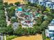 Large water park with multiple pools and a waterslide at 7593 Gathering Dr # 505, Reunion, FL 34747