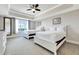 Bright bedroom with two twin beds and large windows at 7593 Gathering Dr # 505, Reunion, FL 34747