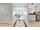 Open concept entryway leading to living and dining areas at 7593 Gathering Dr # 505, Reunion, FL 34747