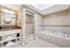 Elegant bathroom with soaking tub, shower and double vanity at 7593 Gathering Dr # 505, Reunion, FL 34747