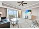 Spacious living area with large windows and city views at 7593 Gathering Dr # 505, Reunion, FL 34747