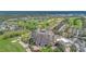 Luxury condo building with golf course views and resort amenities at 7593 Gathering Dr # 505, Reunion, FL 34747