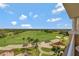 Aerial view showcasing expansive golf course at 7593 Gathering Dr # 505, Reunion, FL 34747