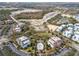 Community pool and surrounding apartment buildings at 7593 Gathering Dr # 505, Reunion, FL 34747