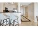 Modern kitchen with stainless steel appliances and granite countertops at 7593 Gathering Dr # 505, Reunion, FL 34747