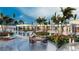 Resort-style pool with outdoor dining and lounge at 9621 Windy Ridge Rd, Windermere, FL 34786