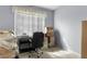 Home office with desk, chair, and ample storage at 145 Lewis Dr, Davenport, FL 33837