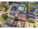 Aerial view of community pool, tennis court and homes at 145 Lewis Dr, Davenport, FL 33837