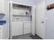 Convenient laundry room with washer, dryer, and cabinets at 145 Lewis Dr, Davenport, FL 33837