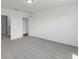 Primary bedroom with access to bathroom and hallway at 1353 Hanoverian Dr, Lake Alfred, FL 33850