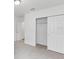 Bedroom with grey carpet and a large closet at 1353 Hanoverian Dr, Lake Alfred, FL 33850