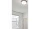 Bright bedroom with window and neutral carpeting at 1353 Hanoverian Dr, Lake Alfred, FL 33850