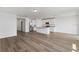 Open concept kitchen with island and stainless steel appliances at 1353 Hanoverian Dr, Lake Alfred, FL 33850