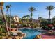Resort-style pool with palm trees and a waterslide at 2909 Calabria Ave, Davenport, FL 33837