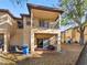Rear view of the house with private patio and balcony at 2909 Calabria Ave, Davenport, FL 33837