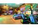 Game room featuring air hockey, racing games, and more at 2909 Calabria Ave, Davenport, FL 33837