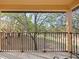 Relaxing balcony overlooking a tree-lined grassy area at 2909 Calabria Ave, Davenport, FL 33837
