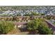 Aerial view of the community, showcasing surrounding homes and landscape at 2909 Calabria Ave, Davenport, FL 33837