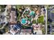 Aerial view of resort amenities including pools, parking, and clubhouse at 2909 Calabria Ave, Davenport, FL 33837