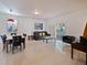 Bright dining area with view to the backyard and living room at 2909 Calabria Ave, Davenport, FL 33837