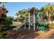 playground with a slide and climbing structures at 2909 Calabria Ave, Davenport, FL 33837