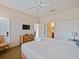 Primary bedroom with king-size bed and private bathroom at 2909 Calabria Ave, Davenport, FL 33837