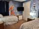 Bedroom with Star Wars mural and two twin beds at 370 Lasso Dr, Kissimmee, FL 34747