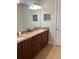 Bathroom with granite countertop and double sinks at 370 Lasso Dr, Kissimmee, FL 34747