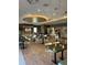 Restaurant interior with multiple tables and chairs at 370 Lasso Dr, Kissimmee, FL 34747