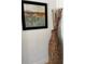 Stylish living room decor with abstract art and tall woven vase at 370 Lasso Dr, Kissimmee, FL 34747