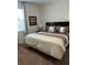 Spacious bedroom with large bed, neutral decor, and ample natural light at 370 Lasso Dr, Kissimmee, FL 34747