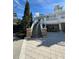 Exterior curved staircase leading up to a restaurant at 370 Lasso Dr, Kissimmee, FL 34747