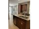 Kitchen with double sink, granite countertops, and stainless steel dishwasher at 370 Lasso Dr, Kissimmee, FL 34747