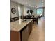Kitchen with granite countertops, stainless steel appliances, and an island at 370 Lasso Dr, Kissimmee, FL 34747