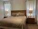 King-size bed in a well-lit bedroom with window coverings at 370 Lasso Dr, Kissimmee, FL 34747