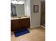 Bathroom with granite countertop and walk-in shower at 370 Lasso Dr, Kissimmee, FL 34747