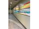 Bright hallway with coastal-themed artwork at 370 Lasso Dr, Kissimmee, FL 34747