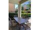 Patio with table and chairs, ready for outdoor dining at 370 Lasso Dr, Kissimmee, FL 34747