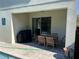 Outdoor patio with table and grill at 370 Lasso Dr, Kissimmee, FL 34747