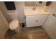 Clean bathroom with single vanity, toilet and shower at 1165 Trappers Trail Loop, Davenport, FL 33896
