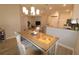 Bright dining area with table and chairs, view into living room at 1165 Trappers Trail Loop, Davenport, FL 33896