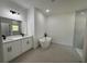 Bathroom features a large soaking tub, double vanity, and shower at 14759 Sw 43Rd Terrace Rd, Ocala, FL 34473