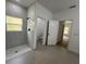 Bathroom with a large walk-in shower and separate toilet area at 14759 Sw 43Rd Terrace Rd, Ocala, FL 34473